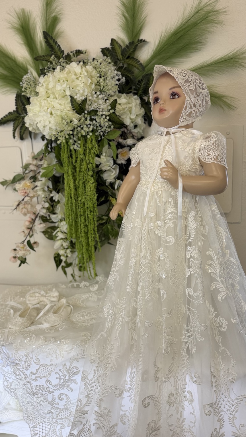 Ivory lace christening gown with matching bonnet